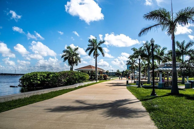 surrounding community featuring a gazebo and a water view