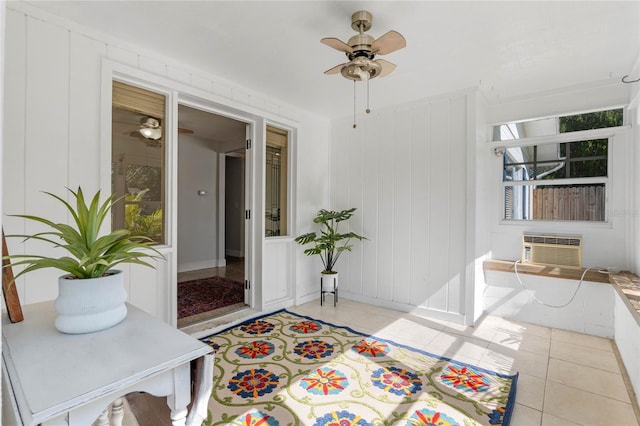 interior space with light tile patterned floors and cooling unit