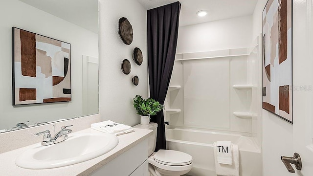 full bathroom featuring vanity, toilet, and shower / bath combo