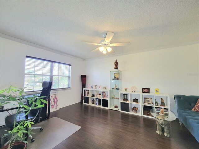 office space with crown molding, ceiling fan, dark hardwood / wood-style floors, and a textured ceiling