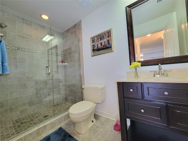 bathroom with tile patterned flooring, vanity, an enclosed shower, and toilet