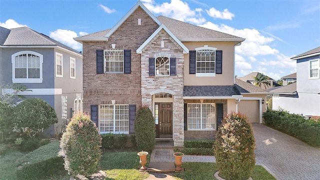 view of front of property with a garage