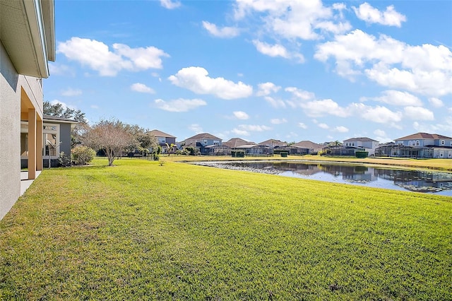 view of yard with a water view