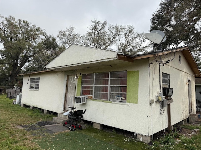 back of house with a yard