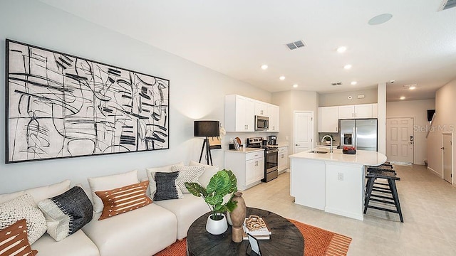 living room with sink