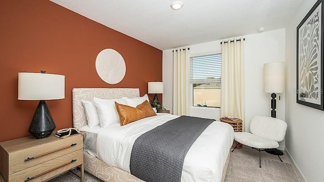 carpeted bedroom with a textured ceiling