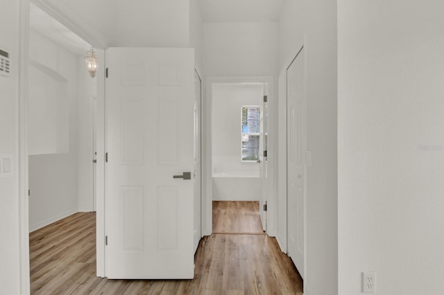 hall featuring light hardwood / wood-style flooring