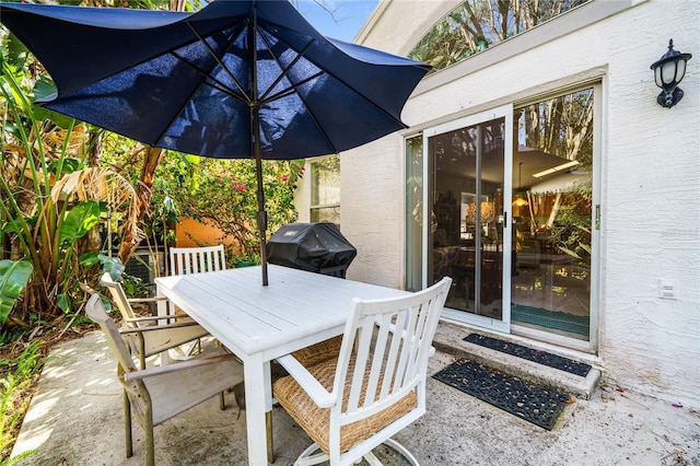 view of patio / terrace with outdoor dining space and area for grilling