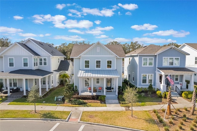 view of front of home featuring a front lawn and a porch