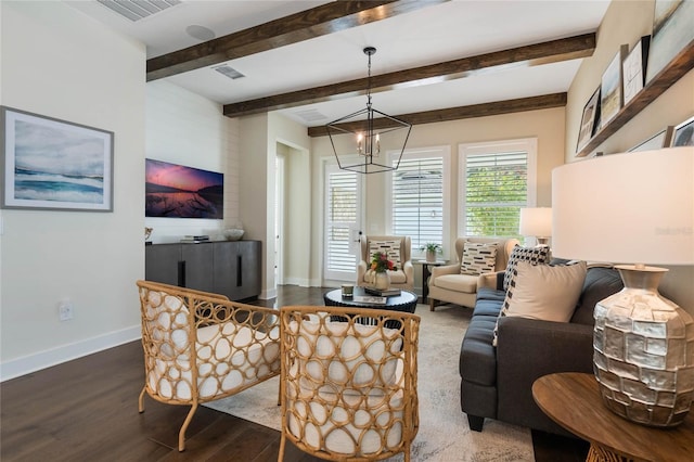 living room featuring beamed ceiling, hardwood / wood-style floors, and a notable chandelier