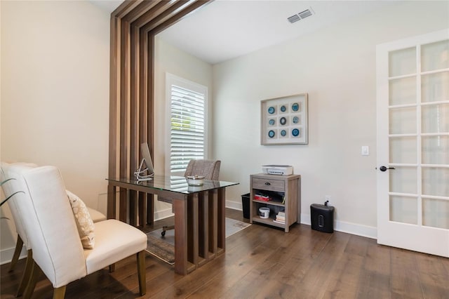 office space with dark hardwood / wood-style flooring