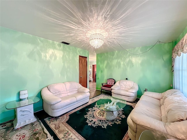 living room featuring a chandelier