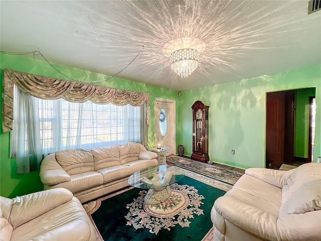 living room with an inviting chandelier