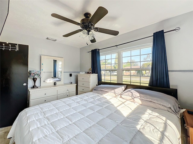 bedroom featuring ceiling fan