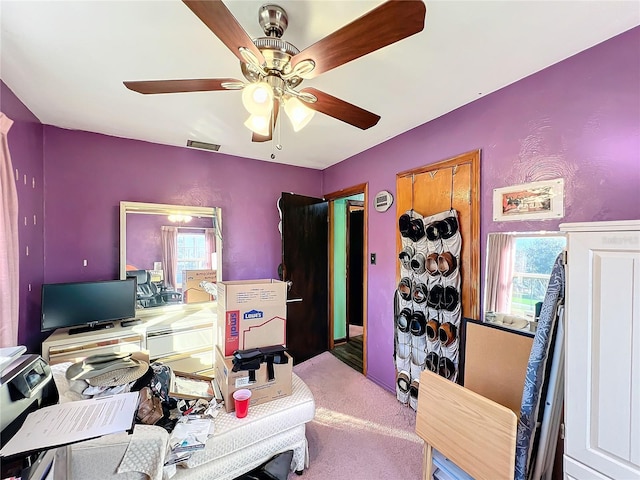 office area with carpet flooring and ceiling fan