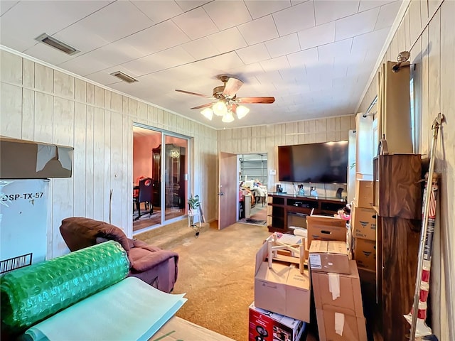 carpeted living room featuring ceiling fan