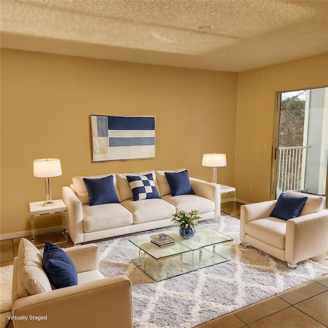 tiled living room with a textured ceiling