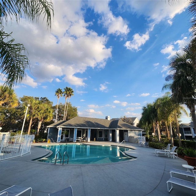 view of swimming pool featuring a patio