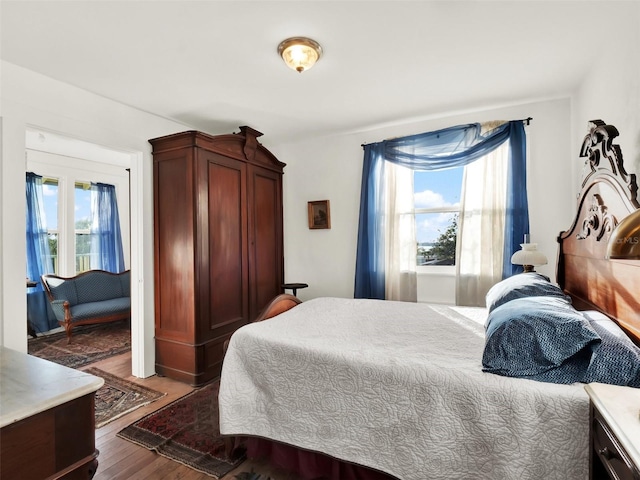 bedroom featuring wood-type flooring