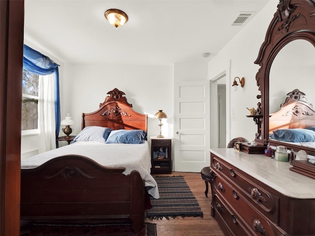 bedroom featuring light hardwood / wood-style flooring