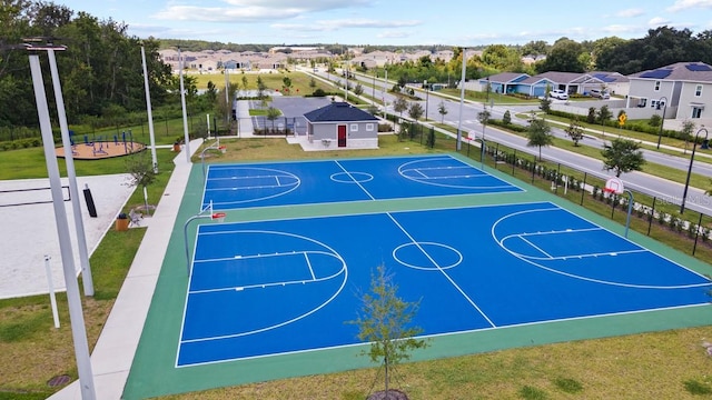 4110 Gooseberry Trl, Kissimmee, FL 34746 - view of basketball court with community basketball court and a residential view