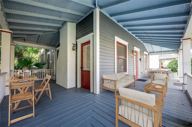 wooden deck with outdoor lounge area