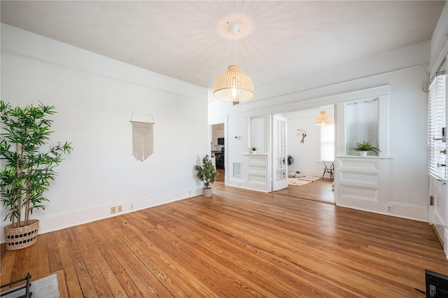 spare room featuring hardwood / wood-style flooring