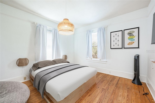 bedroom featuring hardwood / wood-style flooring