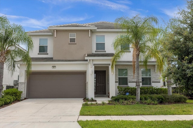 view of front of property with a garage