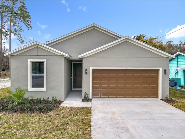 ranch-style home with concrete driveway, central air condition unit, an attached garage, and stucco siding