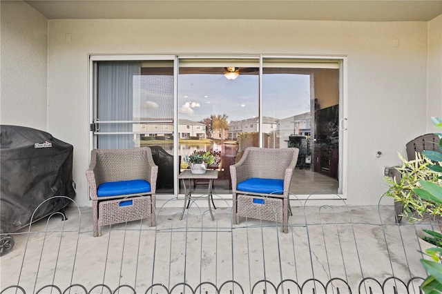 view of patio / terrace with a balcony and area for grilling