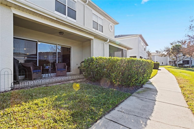 exterior space with a lawn