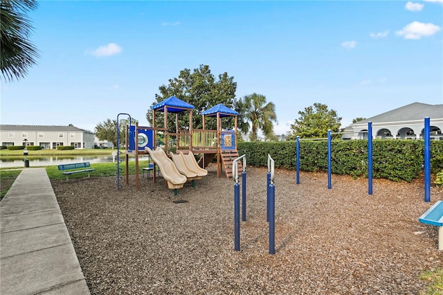 view of play area with a water view