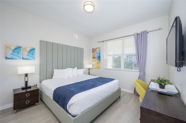 bedroom featuring light wood-type flooring