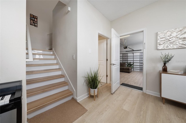 stairway with wood-type flooring