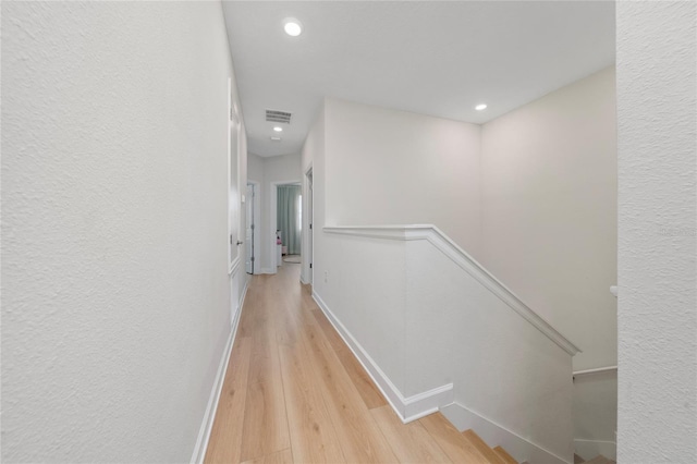 hall featuring light hardwood / wood-style floors