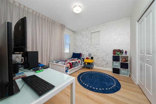 bedroom featuring hardwood / wood-style floors