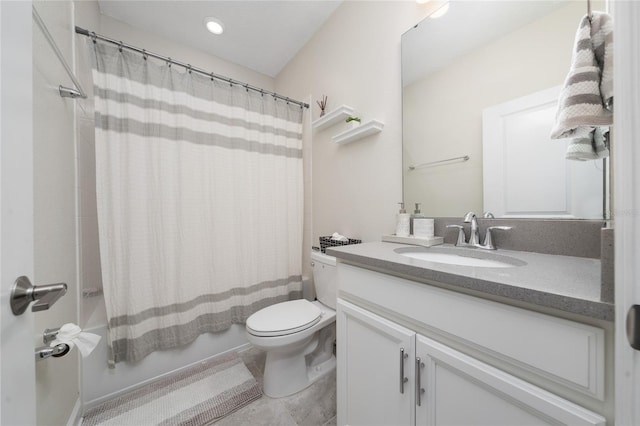 full bathroom with shower / bath combo, vanity, and toilet