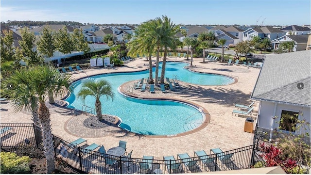 view of pool featuring a patio