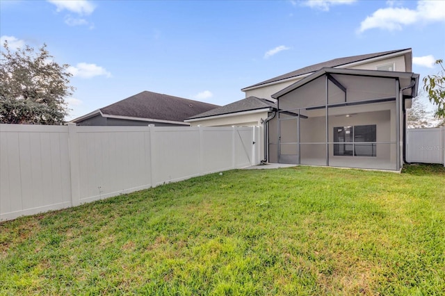 view of yard with a lanai