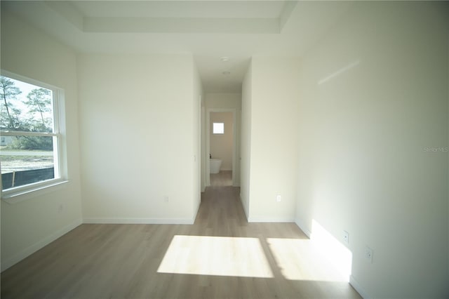 spare room with light hardwood / wood-style flooring