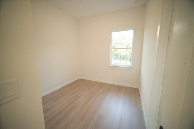 unfurnished room featuring light wood-type flooring