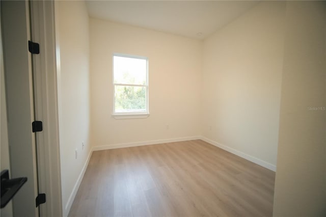 empty room with light wood-type flooring