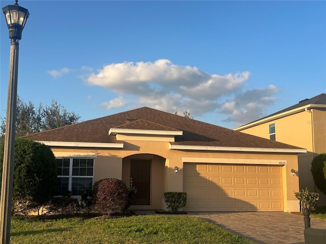 view of front of home with a garage