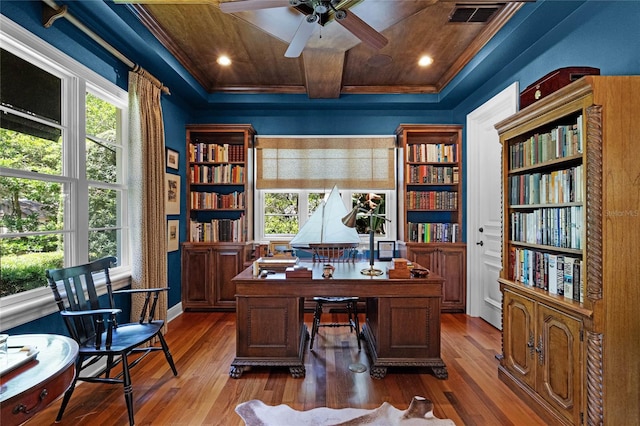 office featuring plenty of natural light, coffered ceiling, and hardwood / wood-style floors