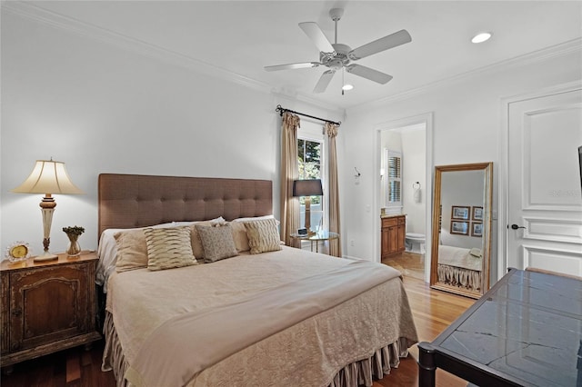 bedroom featuring crown molding, ceiling fan, wood-type flooring, and connected bathroom