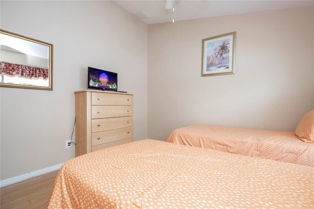 bedroom with light hardwood / wood-style flooring