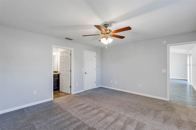 unfurnished bedroom with light carpet, baseboards, visible vents, and a ceiling fan