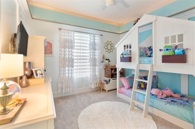 bedroom with light carpet, ornamental molding, and ceiling fan