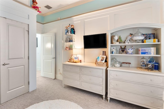 carpeted bedroom with crown molding